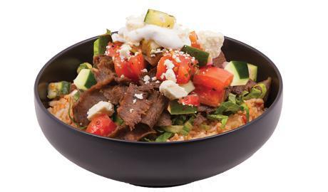 Greek Bowl · Our signature gyro meat, feta cheese, tomato and cucumber salad and z-sauce all over fresh lettuce.