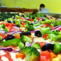 Veggie Pizza Slice · Spinach, broccoli and tomatoes. Made from fresh dough. 