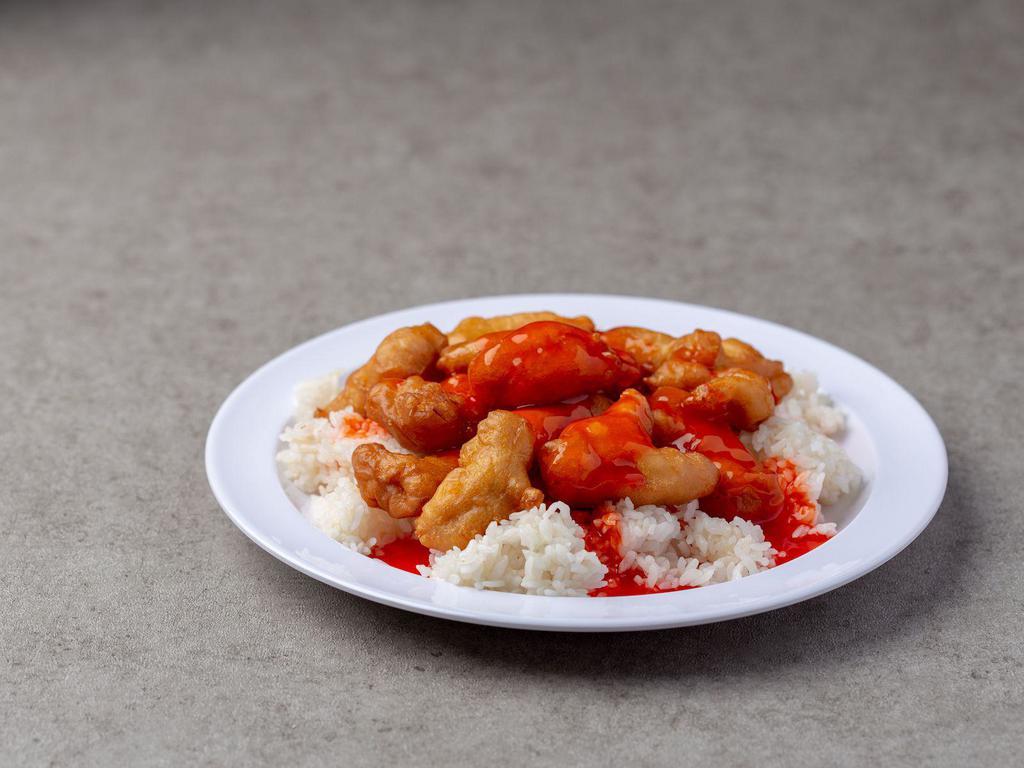 57. Sweet and Sour Chicken · Served with white rice.