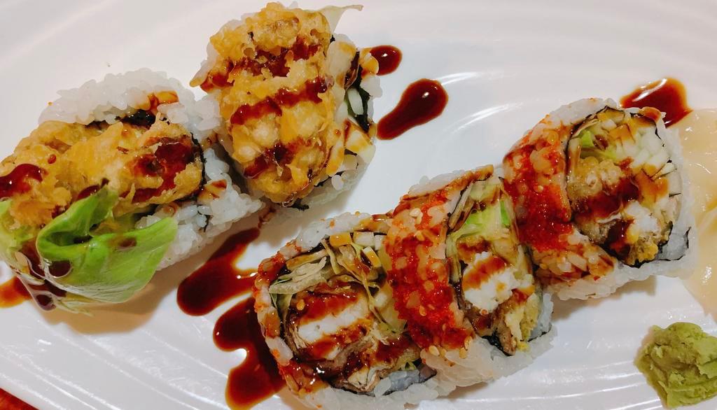 Spider Roll · Battered soft shell crab, lettuce, cucumber, caviar, and eel sauce.