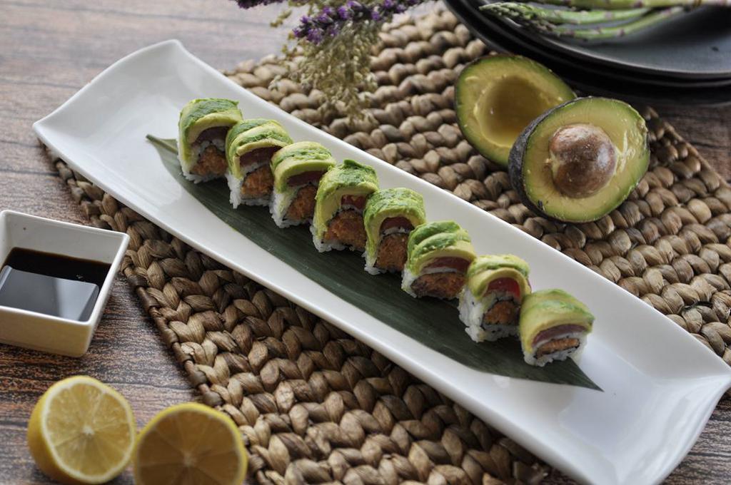 Amazing Tuna Roll · Crunchy spicy tuna roll topped with sliced layer of tuna and another layer of avocado.