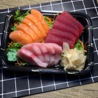 Triple Sashimi · 5 pieces of tuna, 5 pieces of salmon. and 5 pieces of yellowtail.