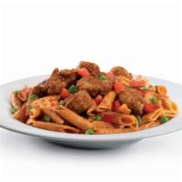 Cajun Chicken and Penne Bowl · Cajun chicken, tomatoes, scallions and a red wine sauce over a whole wheat pasta.