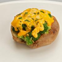 Lean and Loaded Baked Potato · Baked potato topped with low fat cheddar, scallions, fat free sour cream and lean turkey bac...