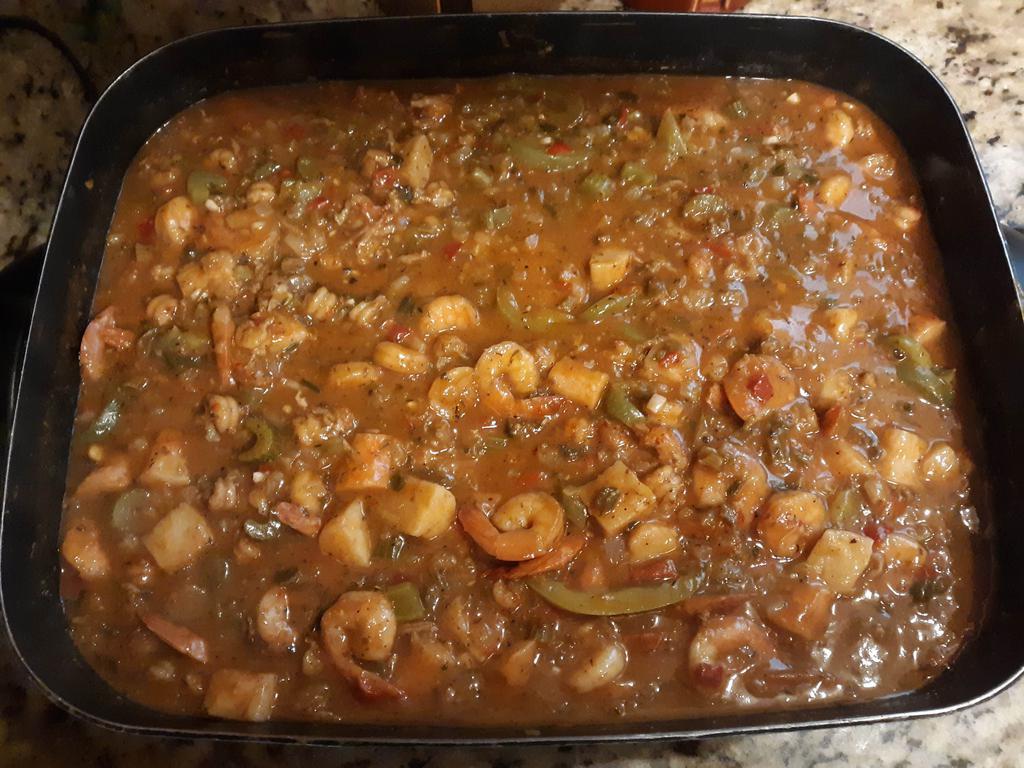 Crawfish Etouffee with Lobster and Jumbo Shrimp · Fresh crawfish, lobster, and shrimp.