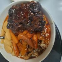 Jamaican me Hungry Oxtails with Rice · Tender Oxtails with rice.