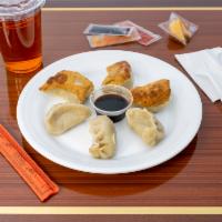 8. Dumplings · 6 pieces. Served with a choice of style.