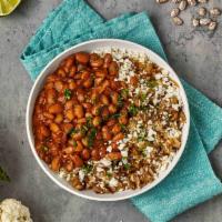 Cauliflower Rice and Beans · Cauliflower rice and house-made pozole beans.