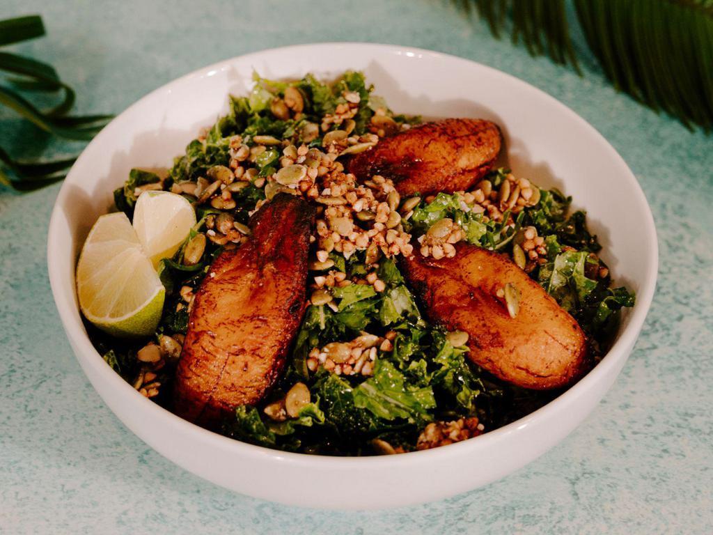Plantain Salad · Citrus rubbed kale topped with buckwheat crunch and sweet plantains.