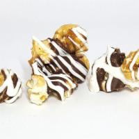 Black Tie · Caramel Corn double-drizzled with white and milk chocolate!