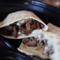 Breakfast Burrito · Served with eggs, cheese, and refried beans and meat of your choice