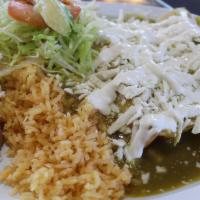 Enchilada Plate · 3 rolled corn tortillas with chicken sauce, cheese and sour cream, served with rice, beans a...
