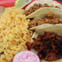 Taco Plate · 3 soft corn tacos with choice of meat, served with rice and beans.