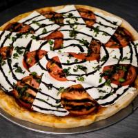 Fresh Mozzarella and Tomato Pizza Pie · 