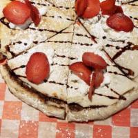 Nutty Nicky Nutella pie · Pizza stuffed with Nutella and whipped cream with powdered sugar. 