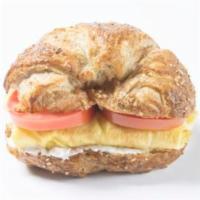 Omelet Multigrain Croissant Sandwich · Beaten eggs that are folded over a filling. Served on a flaky French pastry. 