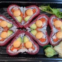 Passion Roll · Spicy and crunchy tuna, crab meat and avocado inside. Wrapped with tuna in a heart shape wit...