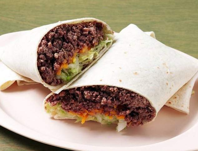 Talita's Original Burrito · Your choice of filling combination with shredded lettuce, feathered cheddar cheese diced onion and Talita's Texas taco sauce