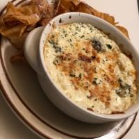 Spinach Artichoke Dip · Served with homemade chips.