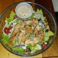 The HUB Salad · Grilled chicken, romaine, grape tomatoes, red onions, feta, craisins, candied walnuts, and s...