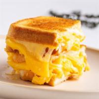 2 Eggs and Cheese Sandwich · Melted American cheese on top of 2 eggs any style.