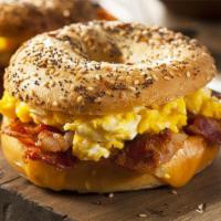 Bacon, 2 Eggs and Cheese Sandwich · Crispy bacon on top of Melted American cheese, 2 Eggs any style.
