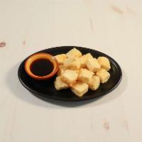 Age Tofu · Deep-fried bean curd with tempura sauce. 