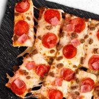 Meat Eater Pan Pizza · Classic tomato sauce, 100% real cheese, pepperoni, ham, beef and sausage.