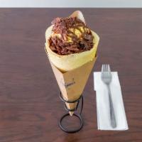 Black Hole Chocolate Crepe · Whipped yogurt, Chocolate mousse, vanilla ice cream and chocolate shavings