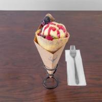 Berry Super Nova Crepe · Yuzu berry compote, pastry cream, vanilla ice cream honeycomb, and shiso leaves.