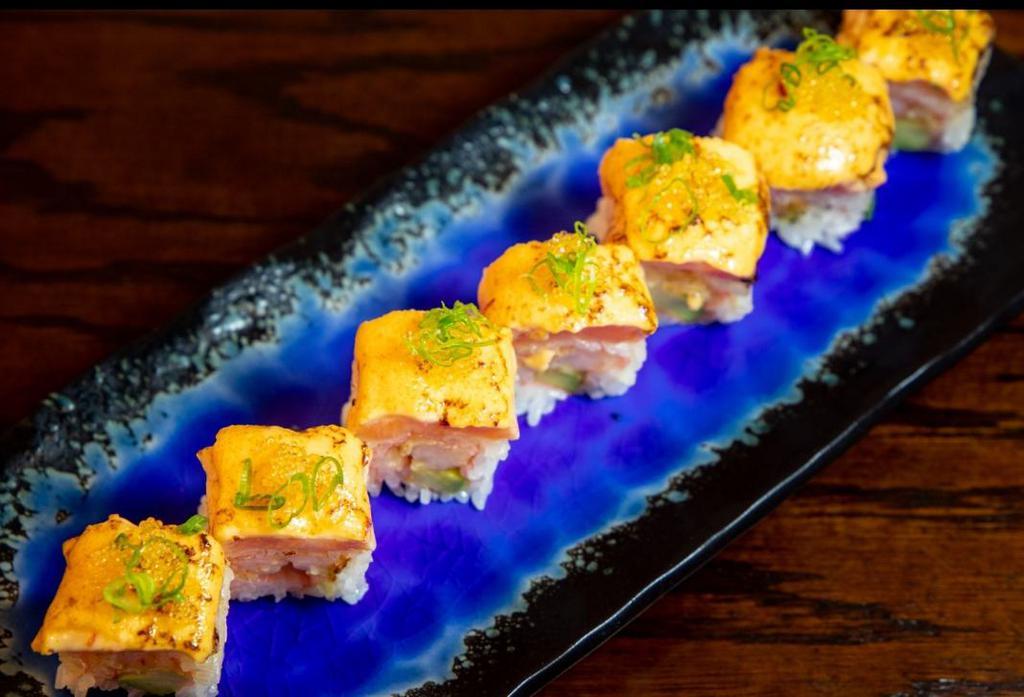 Orion Roll · Shrimp tempura, soybean paper, avocado yuzu tobiko spicy mayo  & torched salmon