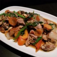 Pad Kapao Duck · Thai basil, onions, mushrooms, carrots, green beans and peppers in garlic-chili paste.