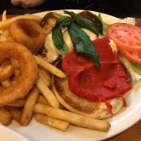 Grilled Chicken Italiano Sandwich · Served with coleslaw & pickle on a hard roll. With fresh mozzarella, roasted peppers and fre...