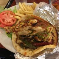 Chicken Fajita Sandwich · Served with coleslaw & pickle on a hard roll. Strips of grilled chicken, grilled onions and ...