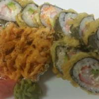 Monkey Roll · Crab, masago, avocado, cream cheese and deep fried with spicy crab on top.