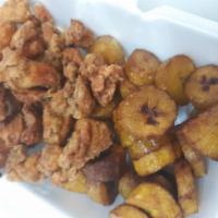 Chicharon con hueso y sin hueso · Con tostones or fries.WITH WASAKAKA OSCARS SAUCE