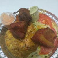 CHICHARRON MOFONGO/FRIED PORK MOFONGO · MASHED Fried PLANTAIN WITH garlic, hkmemade seasoning, dried pork ,salad