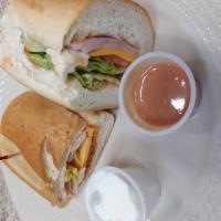 Ham and Cheese Sandwich · Served with fries and soda