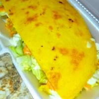 Cachapa Sweet Corn Bread Sandwich (Pork) · Corn bread filled with your choice of meat, lettuces , tomato, cheese, and special house sauce