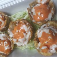 Chicken Mofonguitos · Mashed plantain cups filled with your choice of meat, cheese, and  special house sauce
