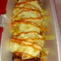 Chicken Canoa · Chicken Canoa, whole sweet plantain, filled with chicken, cheese, corn, and special house sa...