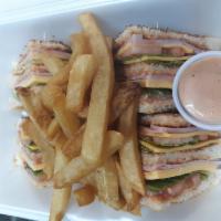 Grilled Chicken Club SÁNDWICH · Serve with Grilled chicken, cheese,ham,lettuce, tomate, mayo, ketchup. And fries