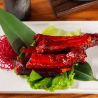 Grilled Baby Spare Ribs (4 Pieces) · Pork spare miles with cooked vegetables, sweet and sour sauce.