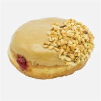 Vegan School Daze · Vegan raised yeast shell filled with raspberry jelly, topped with peanut butter and a side d...