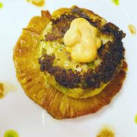 Crab Cake · Jumbo lump crab meat patty served over caramelized pineapple ring, chipotle, aioli, and bals...