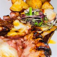 Pulpo Bravo · Grilled Spanish octopus, with spicy potatoes and paprika oil.