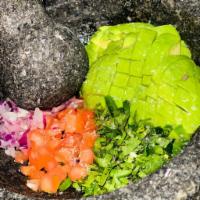 Guacamole & Chips Cold Plate · Made fresh tableside with hass avocado, red onion, diced tomato, jalapeno, cilantro, and lim...