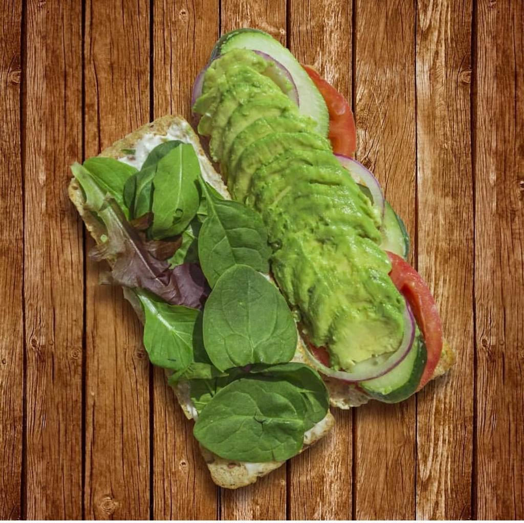 Avocado sandwich · Whole wheat bread, avocado, mix greens, cucumber, tomato, mayo (choice of regular or vegan mayo)