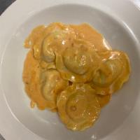 Lobster and shrimp ravioli  · 5 piece ravioli in a lobster shallot tomato cognac cream sauce with crab meat
