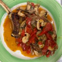 Stuffed Veal Chop · 16 oz center cut veal chop stuffed with spinach, roasted peppers and sharp provolone cheese ...